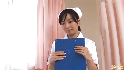 Asian nurse Hina Hanami spreads her legs to tool along a large dick